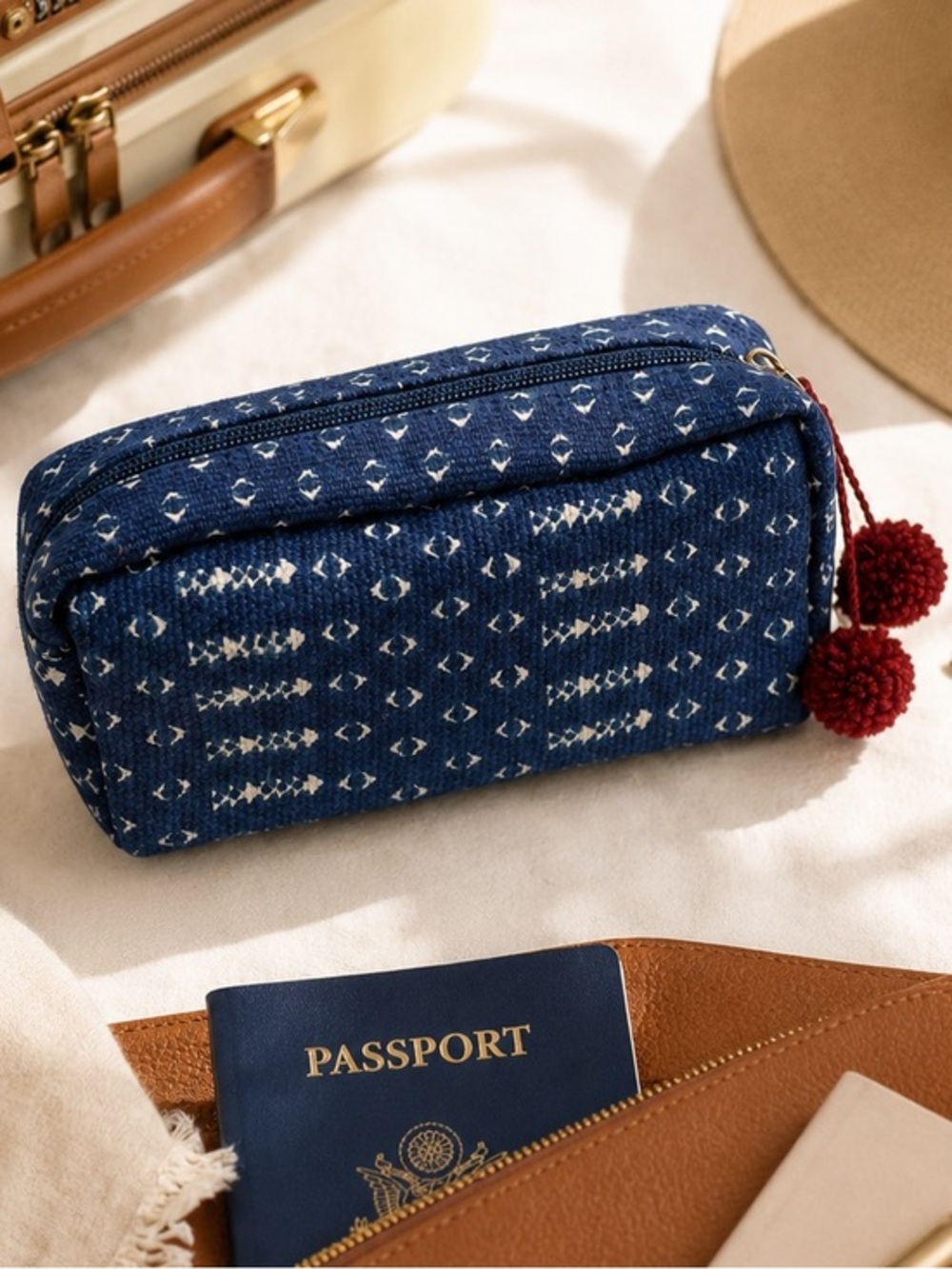 Bongo patterned cosmetics make up bag with pom pom zipper blue and red NWT OBO
